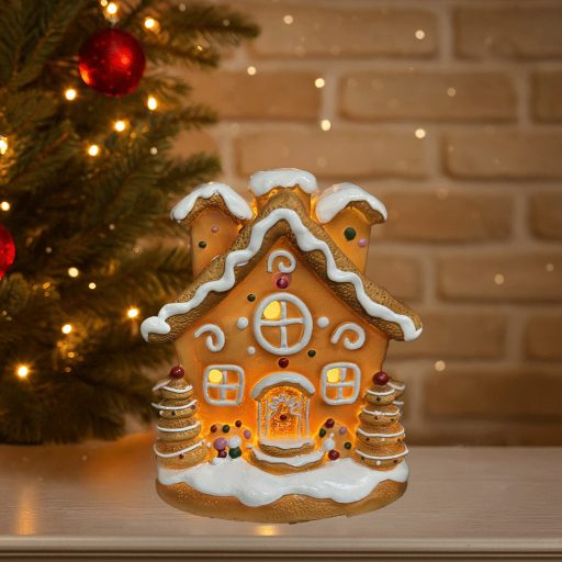 Mézeskalács házikó fenyőfákkal LED-es 12 cm