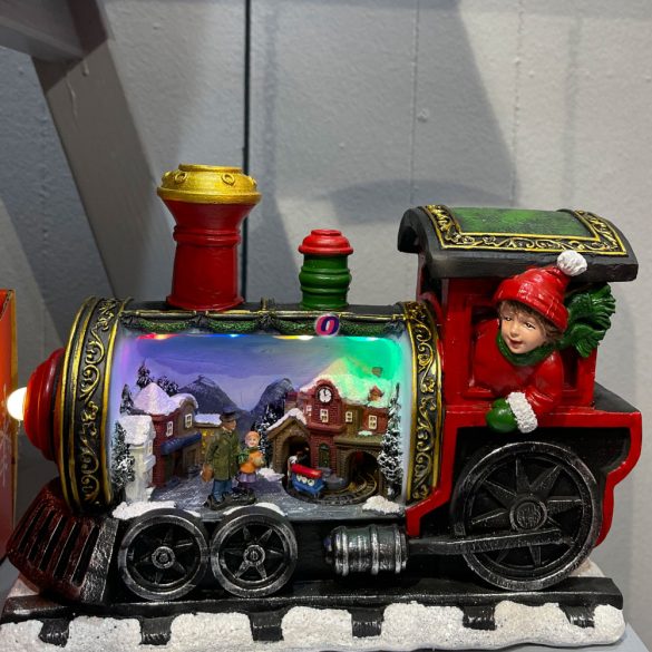 Mozdony karácsonyi jelenettel mozgó vonattal LEDes poly 26,7x12,5x18,5CM színes karácsonyi falu kellék