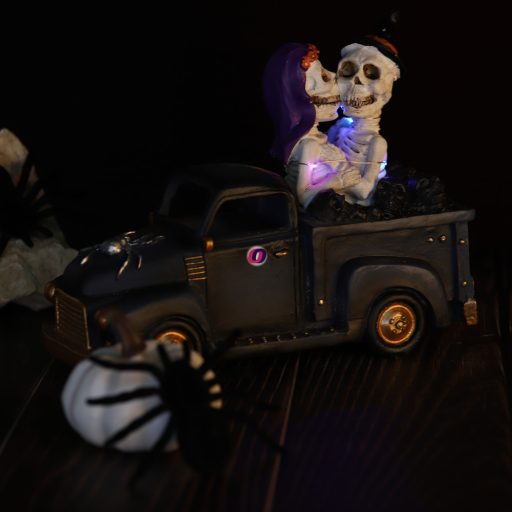 Halloweeni csontváz pár autóval 25 cm LED-es